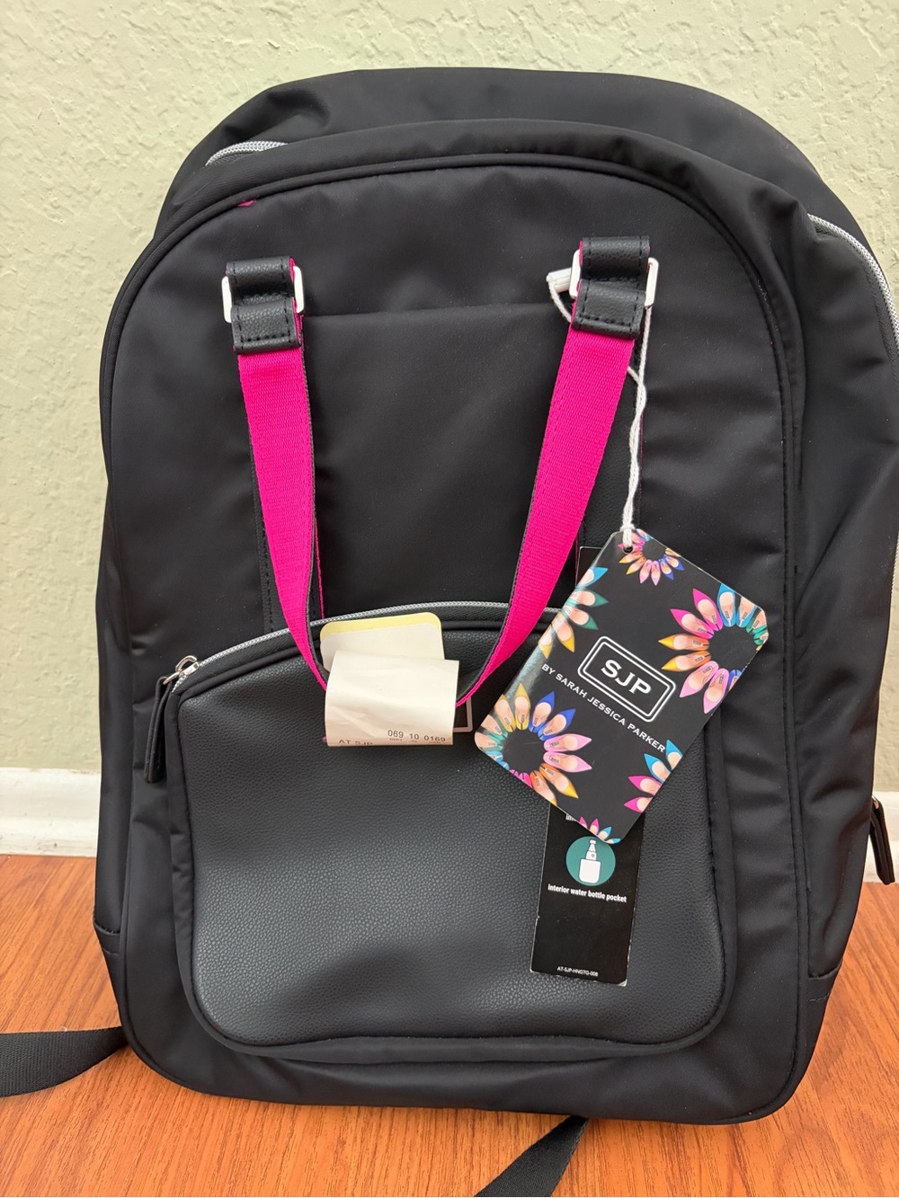 American Tourister Black Backpack with Pink Straps